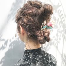 お団子2つのパーティーアレンジ|DaB OMOTESANDOのヘアスタイル